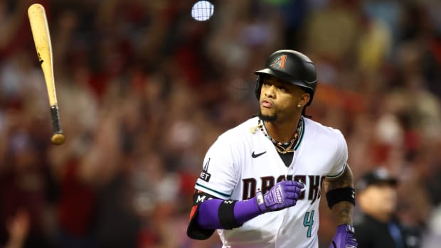 Diamondbacks second baseman Ketel Marte (4) reacts after hitting a home run against the Dodgers.